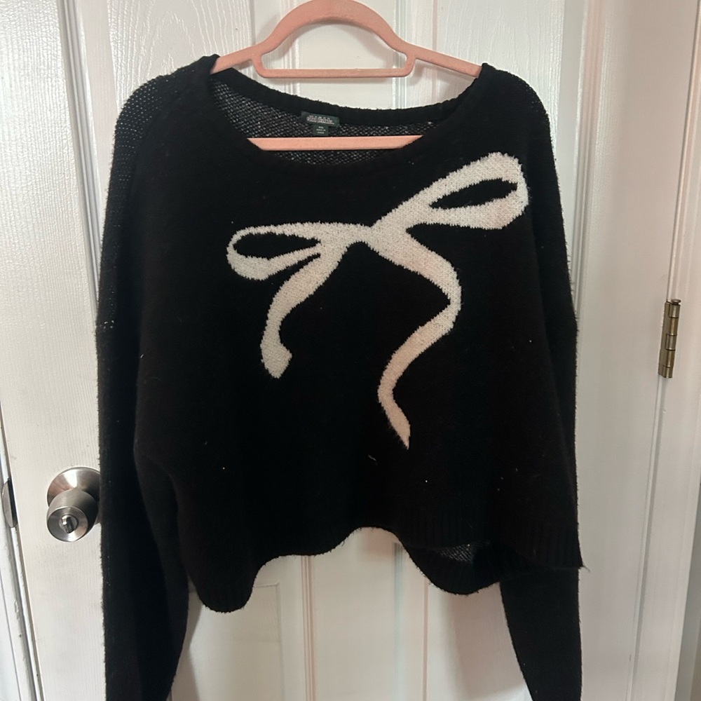 Black Sweater with White Bow Accent